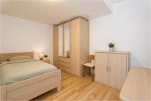 Schlafzimmer UG rechts Mehrfamilienhaus mit Garage und Stellplatz - Wohnen oder investieren dank freiem DG